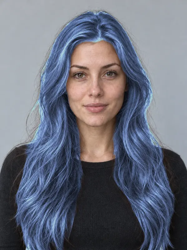 The same demo portrait with blue hair, previewed in the ColourSesh studio